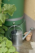 Filling of the watering-can with retrieved rainwater France