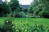 Flower bed and house in La Pellerine garden France