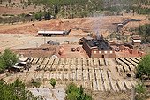 Industrial brickyard close to Shaxi Yunnan China ; overall picture with drying in the foreground