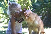 Girl making a hug to a Shiba Inu France 