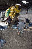 Cement lorry unloading cement for barn floor Cotswolds UK