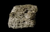 Pumice on black background ; Photo from the book "Les jeunes volcans d'Ardèche" by Emmanuel T. Berger published by Éditions SUD OUEST.