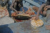 Fishermen cutting a female Hawksbill Sea Turtle Djibouti