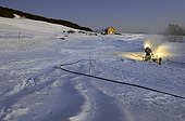 Canon snow on a Nordic ski trail in winter 