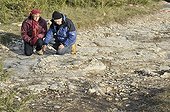 Naturalists have discovered footprints of Sauropod Dinosaurs ; Marie-Hélène Marcaud and Patrice Landry, discoverers of the site. <br>This site is perhaps the largest in the world for the footprints of sauropods.
