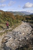 Site of footprints of Sauropod Dinosaurs in mudstone France ; Marie-Hélène Marcaud, co-discoverer.<br>Discover in april 2009 of this spectacular site of Southern Jura. <br>This site is perhaps the largest in the world for the footprints of sauropods.