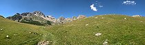 Lawn and alpine meadow rising towards Lake Partias France