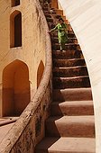 Woman in the stairwell of the observatory Jantar Mantar India ; Jantar Mantar. The maharaja Jai Singh II decided to built this astronomical observatory (1728-1733) with giants instruments in order to change the calendar.