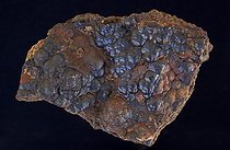 Hematite on black background Luna County New Mexico USA ; Popularly known as "fool's gold" - Formerly used in the production of sulfuric acid