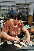 Woman producing custom-made shoes for leprosy patients at the orthopedic workshop of the Deutsche Lepra- und Tuberkulosehilfe relief organisation, DAHW, at the leper colony in Agua de Dios, Colombia, South America