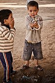 Boys drinking the tap school Khamlia - Morocco 