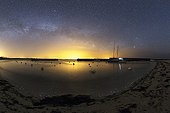 Milky Way and phosphorescent plankton - Hœdic France  ; Phosphorescent plankton light up the shore where small waves come to die. In the sky, the Milky Way Scorpio Swan.