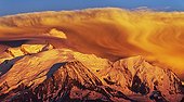 Storm clouds at sunset on the Mont Blanc Massif - France ; Summer Storm in the evening, seen from the Upper Giffre (Desert Platé)
