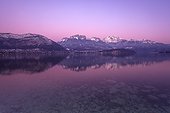 Sunset on Lake Annecy in winter - Alpes France  ; We recognize the mountains La Tournette and the Dents Lanfon.