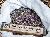 Dry plant (Calluna vulgaris) for infusion with its name in a basket