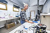 Michel Metzger, OPAR, works in the laboratory of the Maïdo atmospheric observatory, located at an altitude of 2200 meters on La Réunion Island. It is in this laboratory that all the atmospheric samples and measurements made by the equipment installed on the observatory roof are collected and analyzed. The Maïdo atmospheric observatory on La Réunion (one of the 3 measurement sites of the OPAR (Observatoire de Physique de l'Atmosphère de La Réunion), has been installed since October 2012 on the Piton Maïdo at an altitude of 2,200 meters. The laboratory is equipped with active and passive remote sensing instrumentation, enabling long-term, high-quality measurements of the vertical profiles of numerous climatic variables. It enables us to monitor atmospheric and climatic parameters in a context of accelerating climate change, and benefits from a unique location in the tropical southern hemisphere, where observations are extremely rare. The Maido observatory has several major advantages. (1) Its latitudinal position for studying stratospheric transport processes. (2) Its altitude means it is free from pollution, humidity and light, considerably improving the quality of remote sensing measurements for studying the chemical composition of the atmosphere. OPAR's observations are part of several international observation networks, including NDACC (Network for the Detection of Atmospheric Composition Changes) and GAW (Global Atmospheric Watching).