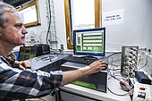 Michel Metzger, OPAR, works in the laboratory of the Maïdo atmospheric observatory, located at an altitude of 2200 meters on La Réunion Island. It is in this laboratory that all the atmospheric samples and measurements made by the equipment installed on the observatory roof are collected and analyzed. The Maïdo atmospheric observatory on La Réunion (one of the 3 measurement sites of the OPAR (Observatoire de Physique de l'Atmosphère de La Réunion), has been installed since October 2012 on the Piton Maïdo at an altitude of 2,200 meters. This laboratory is equipped with active and passive remote sensing instrumentation, to provide long-term, high-quality measurements of the vertical profiles of numerous climatic variables. It enables us to monitor atmospheric and climatic parameters in a context of accelerating climate change, and benefits from a unique location in the tropical southern hemisphere, where observations are extremely rare. The Maido observatory has several major advantages. (1) Its latitudinal position for studying stratospheric transport processes. (2) Its altitude means it is free from pollution, humidity and light, considerably improving the quality of remote sensing measurements for studying the chemical composition of the atmosphere. OPAR's observations are part of several international observation networks, including NDACC (Network for the Detection of Atmospheric Composition Changes) and GAW (Global Atmospheric Watching).