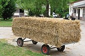 Straw bale on trailer, France