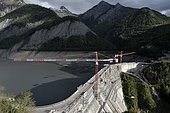 Work on reinforcement of the Chambon dam, in 2014. The reinforcement works allow to treat 3 problems observed on the dam, caused mainly by the phenomenon of alkali-reaction. Alps, France