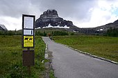 Hiker on a hiking trail in Glacier National Park, Montana, USA