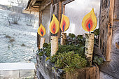 Decoration "Candles" painted on a birch branch in winter, Lorraine, France