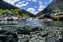 Mid-air view mid-water of the river Neste de Couplan, Neouvielle Massif, Hautes-Pyrénées, France