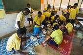 Children reading in a school, Efate Island, Vanuatu