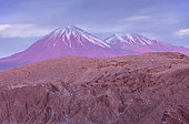 Valle de la Muerte (Valley of the Death), in background volcanoes Licancabur and Juriques, Atacama desert. Region de Antofagasta. Chile