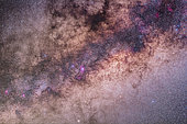 The centre of the galaxy area of the Milky Way toward Sagittarius and Scorpius, with the Sagittarius Starcloud right of centre, and the Lagoon Nebula (M8) left of centre. The Cat's Paw Nebula (NGC 6334) in Scorpius is at upper right, the Swan Nebula (M17) and Eagle Nebula (M16) are at lower left. To the right of them is the Small Sagittarius Starcloud (M24). At the very top is the Snake Nebula (B72). The main mass of dark nebula is the Pipe Nebula (B78). Above M24 at left is the open cluster M23 while below the M24 star cloud is the cluster M25. The globular M22 is at the bottom edge. At right of frame are the open clusters M6 (in the dark area of the Milky Way) and M7 (in the bright starcloud). I took this at about 3 am local time, Monday, March 31 from the Warrumbungles Motel grounds near Coonabarabran, NSW, Australia at the OzSky Star Safari 2014. This is a stack of 4 x 4 minute exposures at f/2.8 with the Sigma 50mm lens on the Canon 60Da at ISO 800. The camera was tracking the sky using the iOptron SkyTracker. I've oriented it horizontally as that's the way the camera was oriented to frame the area as it was rising in the east in the sky. However, from northern latitudes, this area would be framed vertically with the right side of the image in Scorpius (the area farthest south in the Milky Way) at bottom.