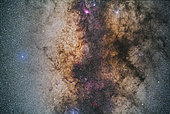 The Milky Way in the region of the Galactic Centre in Sagittarius, photographed with it high in the sky from Australia. The actual centre of the Galaxy lies near centre of the frame. The dark clouds that form the Dark Horse and the Pipe Nebula are at right. The clusters Messier 6 and Messier 7 are at bottom, with M7 lost in the star clouds of the Milky Way. The Lagoon and Trifid Nebulas, M8 and M20, are at top. Saturn is the bright star at top right. The Dark Horse region of dark dust is at right, with the darkest part below being the Pipe Nebula, B78. The small Snake Nebula, B72, is at right. This is a stack of 4 x 2-minute exposures at f/2.8 with the Rokinon 85mm lens, and filter-modified Canon 5D MkII at ISO 2500. Taken from Tibuc Gardens Cottage near Coonabarabran, Australia. The image could be turned 90° CCW to better resemble its orientation in the sky in which it was photographed in the southern hemisphere, This orientation matches the view in the northern hemisphere. Some haze in one of the frames added the natural star glows.