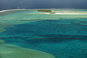 Aitutaki. Cook Island. Polynesia. South Pacific Ocean. Some of the beaches with palm tres. Aitutaki (Aye-too-tah-ki) is an island in the Southern Cook Islands a 45 minute flight from the capital island of Rarotonga. Aitutaki lagoon and its islands are breathtakingly beautiful. The classic picture postcard of small palm tree fringed tropical island, with shallow, warm turquoise waters, corals, tropical fish and blue skies is taken here. The lagoon is large, taking about an hour in a boat to cross it. Tourism facilities are well developed, but are still low key enough not to intrude on the nature of the island. The larger island is split into different villages, Vaipae & Tau'tu are the largest and are located on the south east side of the island, Arutanga is often referred to as town and is on the south west side of the island. Arutanga has a center area for shopping, and the Telecom Office (also the Post Office), the Westpac Bank and the Bank of the Cook Islands are located here. Here you will also find the Blue Nun and Wharf. Amuri is a general term for the north end of the island which contains most of the tourist accommodations and less population. The other villages on the island are Uriea, Rearea, Rama, Vaipeka and Nikaupara.