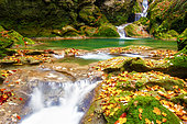 Waterfalls on the Urederra river in autumn, baquedano Urederra river, Navarra, Spain
