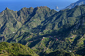 Landscape of the Anaga peninsula, on the island of Tenerife in the Canaries. Characteristic ravine relief - in the background the protected islet of Roques de Anaga - Parque Rural de Anaga - Tenerife - Canary Islands