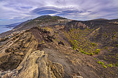 The crater of Teneguia, Island of La Palma, in the Canaries. Lenticular cloud over the Taburiente caldera - Seen from a crater whose eruption dates from 1971 - Natural Monument of Teneguia Volcanoes - La Palma