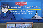 Poster and boxes of the Jean Burel cannery, Marin de Concarneau, shop, village labeled Les Plus Beaux Villages de France, Locronan, Finistère, France