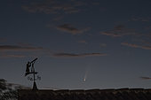 Comet NEOWISE and wind vane in the shape of an astronomer, July 2020