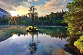 Lake Crestasee at sunrise, water reflection, Flims, Canton Graubünden, Switzerland, Europe