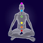 Gray silhouette of man sitting with seven chakra energy centers, on dark blue background.