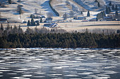 Frozen Lac des Rousses, view of Les Plans, Les Rousses, Jura, France
