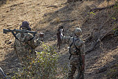 Anti poaching army team researching signs in Kruger national park, South Africa