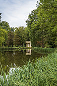 The English garden of Chantilly castle and its temple of Venus in autumn, Oise, France