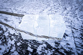 Extraction of ice cube from the Lena river for use as drinking water by residents without access to running water, Yakutsk, Republic of Sakha, Russia