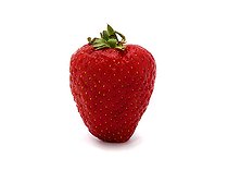 One ripe strawberry on a light background. Natural color and shape. Close-up.