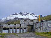 Abandoned fish factory in Eyri at fjord Ingolfsfjoerdur. The Westfjords (Vestfirdir) in Iceland during late autumn Herbst. Europe, Northern Europe, Iceland
