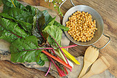 Chard, Beta vulgaris, different varieties, Chickpea, wooden spoon