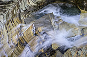 Waterfall in the Clou valley. The Clou stream runs through very resistant quartzite. The Clou valley, located in the commune of Sainte-Foy-Tarentaise, is listed as a "classified site" in the Savoie department. Alps, France