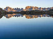 The summits of Brenta mountain range are reflected in Lago Nero. Brenta group in the Dolomites, part of UNESCO world heritage The Dolomites. Europe, Italy, Val Rendena