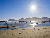 Melting ice on shore. Landscape at the Sermilik (Sermiligaaq) icefjord in the area Ammassalik in East Greenland. North America, Greenland, Ammassalik, Danish territory, autumn
