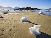 Melting ice on shore. Landscape at the Sermilik (Sermiligaaq) icefjord in the area Ammassalik in East Greenland. North America, Greenland, Ammassalik, Danish territory, autumn