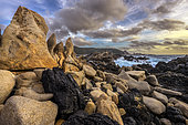 The Pointe de Campomoro in a strong westerly wind (U Libeccio). Leucocratic granites and veins of softer diorite, hollowed out by taffonis and sculpted by marine erosion - Pointe de Campomoro - Gulf of Valinco - South Corsica